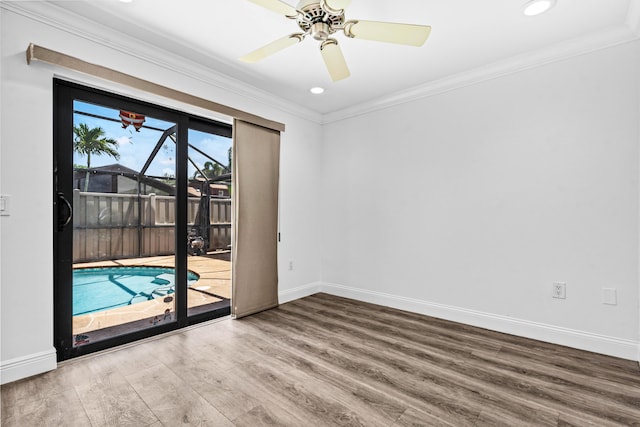 9676 Boca Gardens Pkwy Unit C, Boca Raton, FL 33496 - spare room featuring wood finished floors, crown molding, recessed lighting, and a ceiling fan