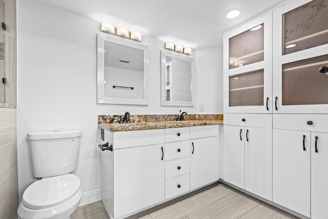 9676 Boca Gardens Pkwy Unit C, Boca Raton, FL 33496 - bathroom featuring double vanity and toilet