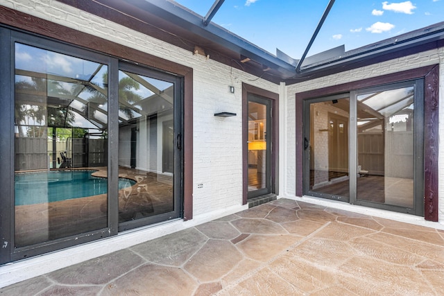 9676 Boca Gardens Pkwy Unit C, Boca Raton, FL 33496 - view of patio / terrace featuring glass enclosure