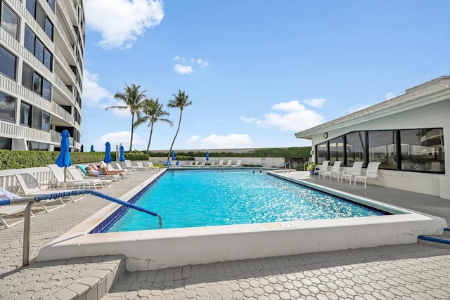 pool with a patio area