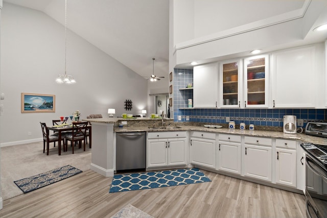 kitchen featuring stainless steel dishwasher, a peninsula, stove, high vaulted ceiling, and a sink