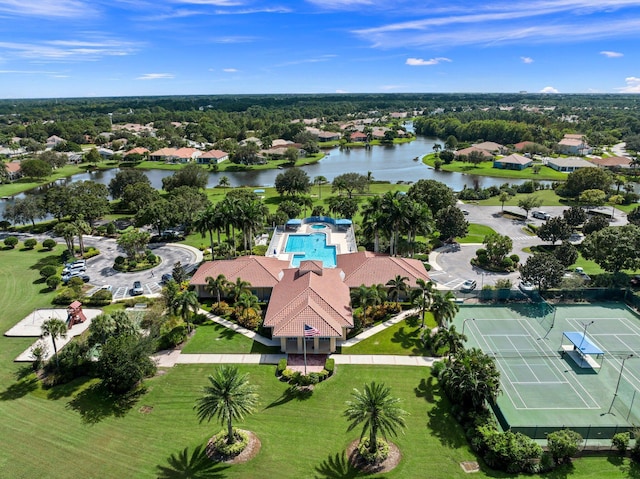 bird's eye view featuring a water view and a residential view