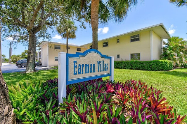 813 Hummingbird Way Unit 7A, North Palm Beach, FL 33408 - community / neighborhood sign with a yard