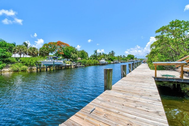 813 Hummingbird Way Unit 7A, North Palm Beach, FL 33408 - dock featuring a water view