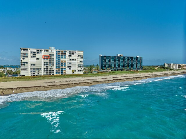 aerial view featuring a beach view and a water view