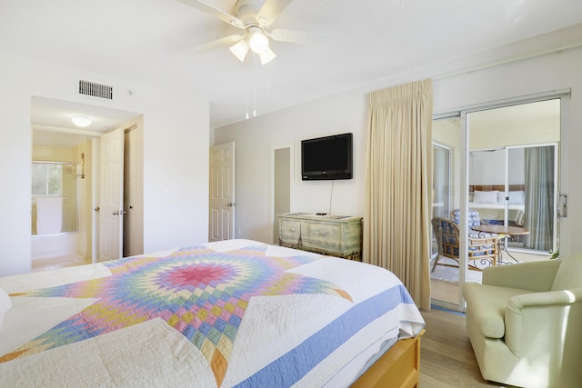248 Village Blvd Unit 3203, Tequesta, FL 33469 - bedroom with a ceiling fan, visible vents, and light wood-style flooring