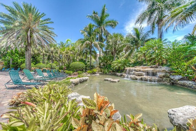 248 Village Blvd Unit 3203, Tequesta, FL 33469 - view of community with a small pond