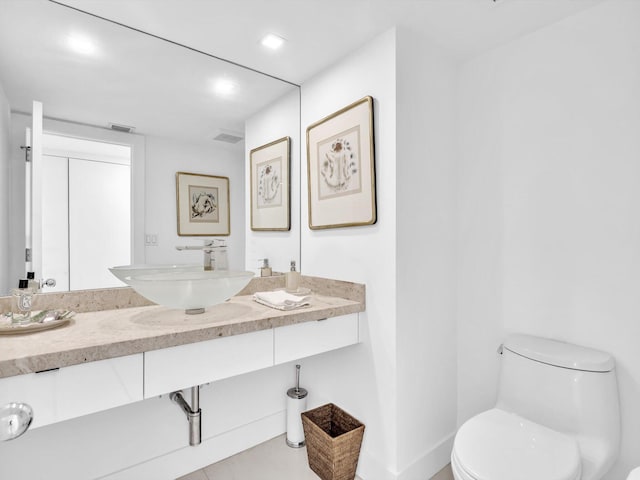 3300 S Ocean Blvd Unit 108S, Palm Beach, FL 33480 - bathroom featuring visible vents, vanity, baseboards, toilet, and recessed lighting