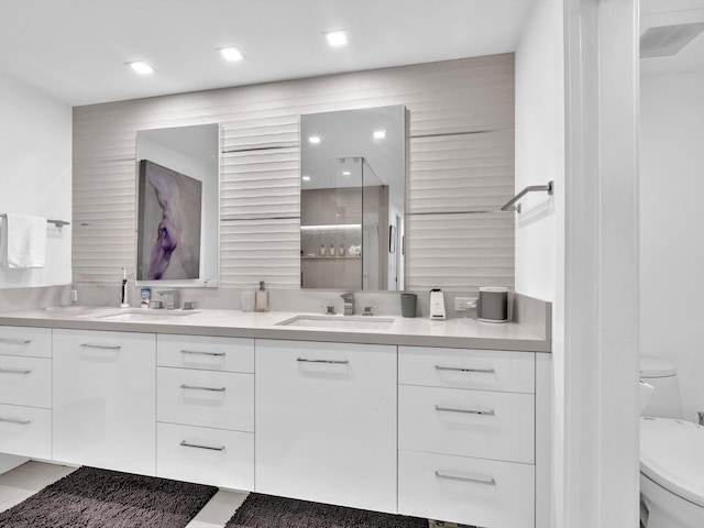 3300 S Ocean Blvd Unit 108S, Palm Beach, FL 33480 - full bath featuring a sink, recessed lighting, toilet, and double vanity