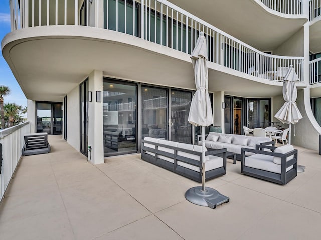 3300 S Ocean Blvd Unit 108S, Palm Beach, FL 33480 - view of patio / terrace with an outdoor living space and a balcony