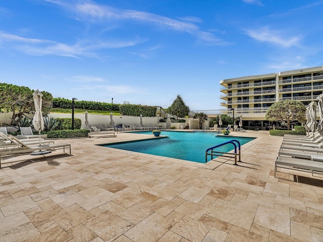 3300 S Ocean Blvd Unit 108S, Palm Beach, FL 33480 - pool featuring a patio and fence