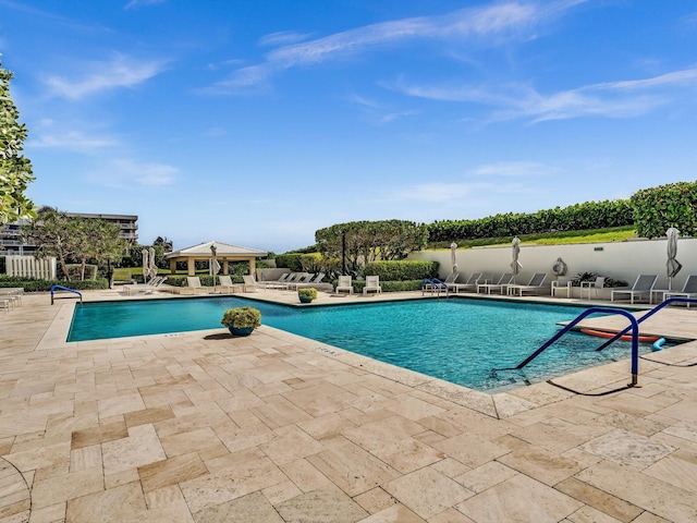 3300 S Ocean Blvd Unit 108S, Palm Beach, FL 33480 - community pool with a patio area and fence