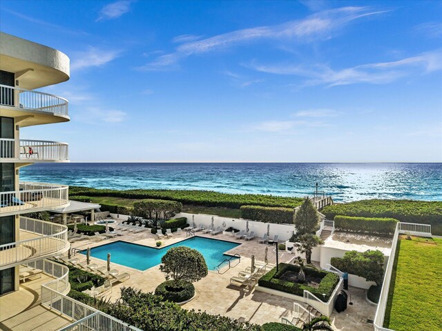 3300 S Ocean Blvd Unit 108S, Palm Beach, FL 33480 - community pool featuring fence, a water view, and a patio area
