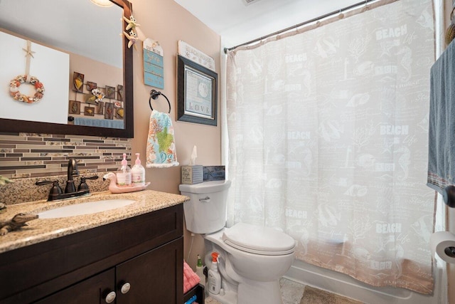 1627 SE Green Acres Cir Unit Z-203, Port Saint Lucie, FL 34952 - bathroom with vanity, shower / tub combo, toilet, and tasteful backsplash