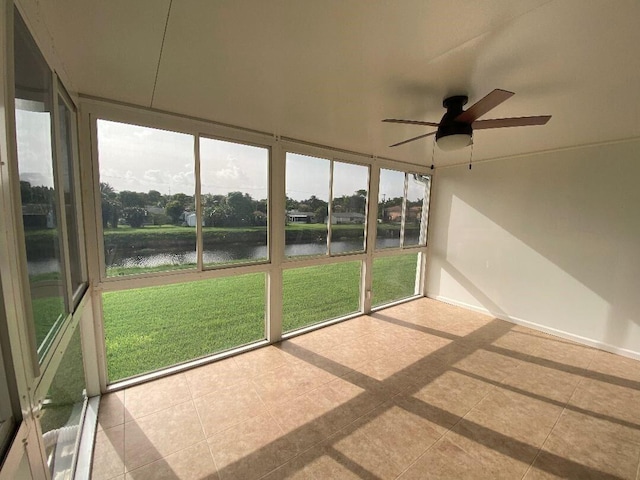 1120 Mahogany Way Unit 203, Delray Beach, FL 33445 - unfurnished sunroom featuring a water view and a ceiling fan