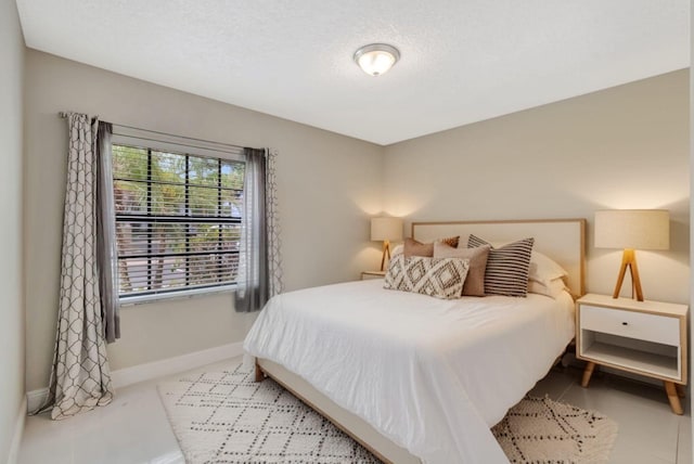 5438 Verona Dr Unit H, Boynton Beach, FL 33437 - bedroom with baseboards and a textured ceiling