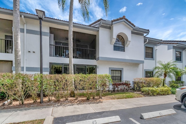 5438 Verona Dr Unit H, Boynton Beach, FL 33437 - view of building exterior featuring uncovered parking