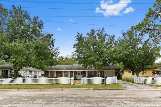 2104 S 26th St, Fort Pierce, FL 34947 - single story home with driveway and brick siding
