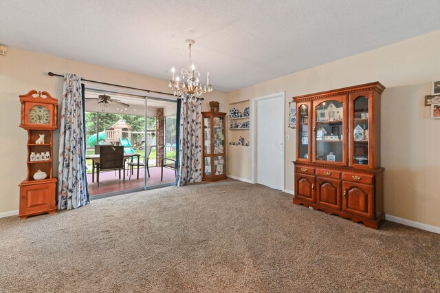 2104 S 26th St, Fort Pierce, FL 34947 - carpeted spare room with a chandelier, baseboards, and a ceiling fan
