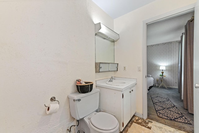 2104 S 26th St, Fort Pierce, FL 34947 - bathroom with vanity, toilet, and ensuite bathroom