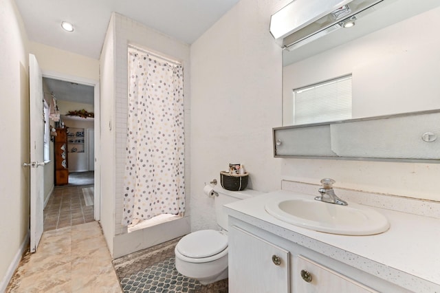 2104 S 26th St, Fort Pierce, FL 34947 - full bath with curtained shower, toilet, vanity, and tile patterned floors