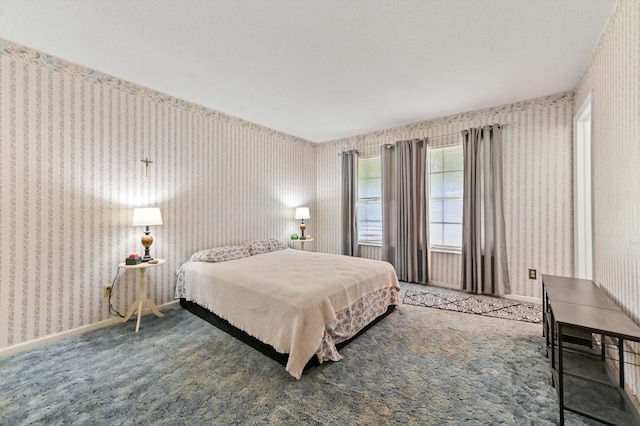 2104 S 26th St, Fort Pierce, FL 34947 - carpeted bedroom with wallpapered walls and baseboards