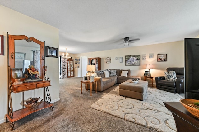 2104 S 26th St, Fort Pierce, FL 34947 - living area featuring carpet, a chandelier, ceiling fan, and baseboards
