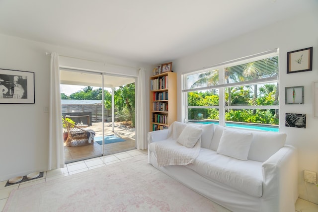 sitting room with tile patterned floors