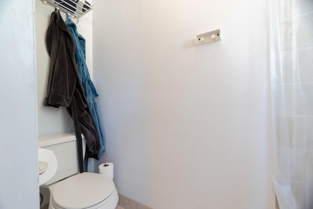 bathroom featuring toilet