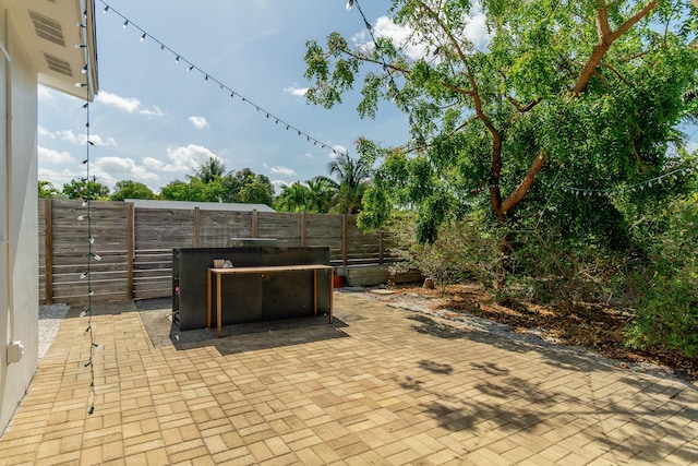 view of patio with a fenced backyard