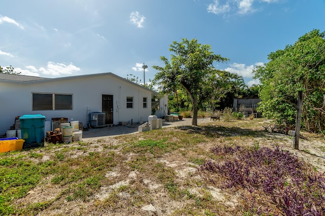 view of yard with a patio area and cooling unit