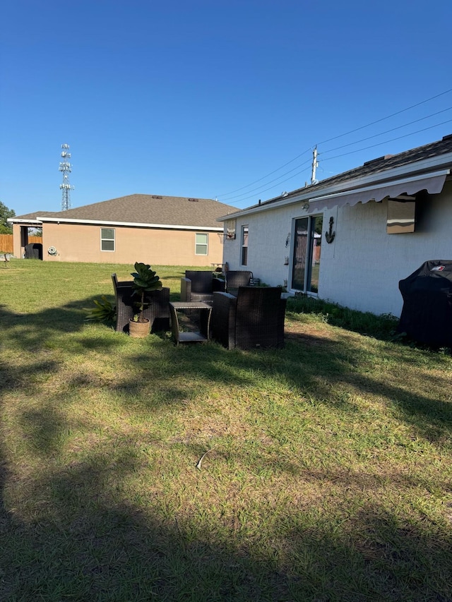 133SW SW Becker Rd, Port Saint Lucie, FL 34953 - back of house with an outdoor living space and a yard