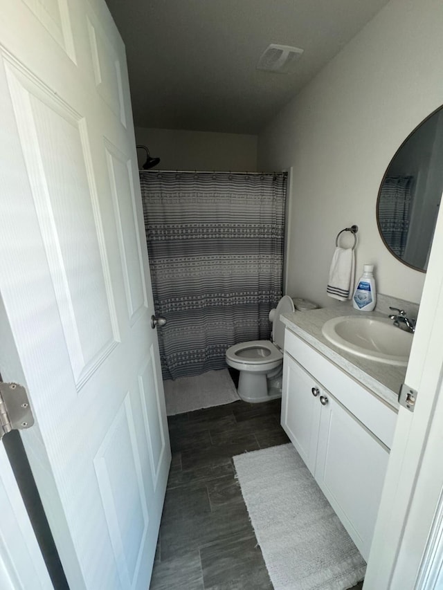 133SW SW Becker Rd, Port Saint Lucie, FL 34953 - full bath with vanity, toilet, curtained shower, and visible vents