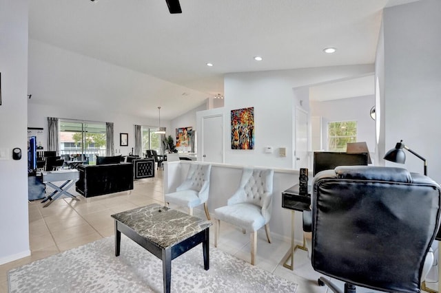 7669 Springwater Pl Unit 202, Boynton Beach, FL 33437 - living room featuring baseboards, light tile patterned floors, lofted ceiling, and a healthy amount of sunlight