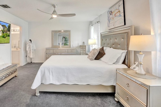 7669 Springwater Pl Unit 202, Boynton Beach, FL 33437 - bedroom featuring connected bathroom, ceiling fan, dark colored carpet, baseboards, and visible vents