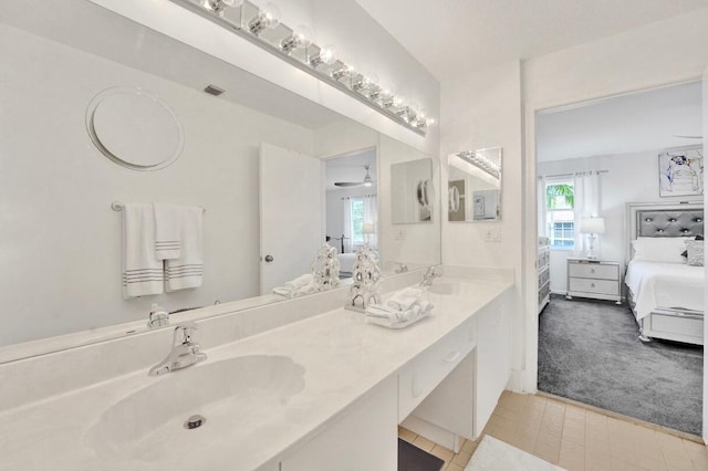 7669 Springwater Pl Unit 202, Boynton Beach, FL 33437 - bathroom featuring a sink, visible vents, ensuite bath, and a wealth of natural light