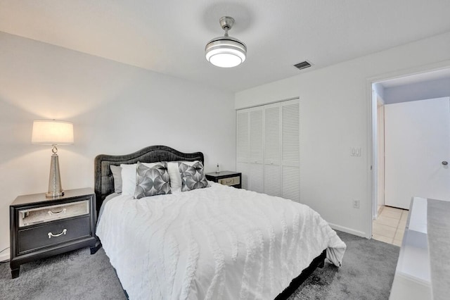 7669 Springwater Pl Unit 202, Boynton Beach, FL 33437 - carpeted bedroom featuring a closet and baseboards