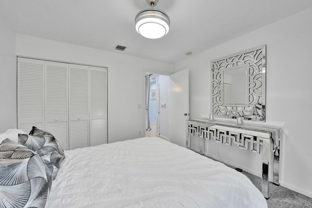 7669 Springwater Pl Unit 202, Boynton Beach, FL 33437 - bedroom featuring baseboards, visible vents, and a closet