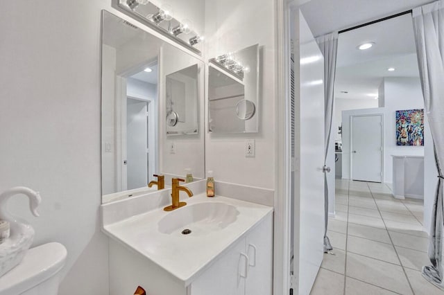 7669 Springwater Pl Unit 202, Boynton Beach, FL 33437 - bathroom with toilet, tile patterned floors, and vanity