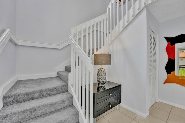 7669 Springwater Pl Unit 202, Boynton Beach, FL 33437 - stairs featuring baseboards and tile patterned flooring