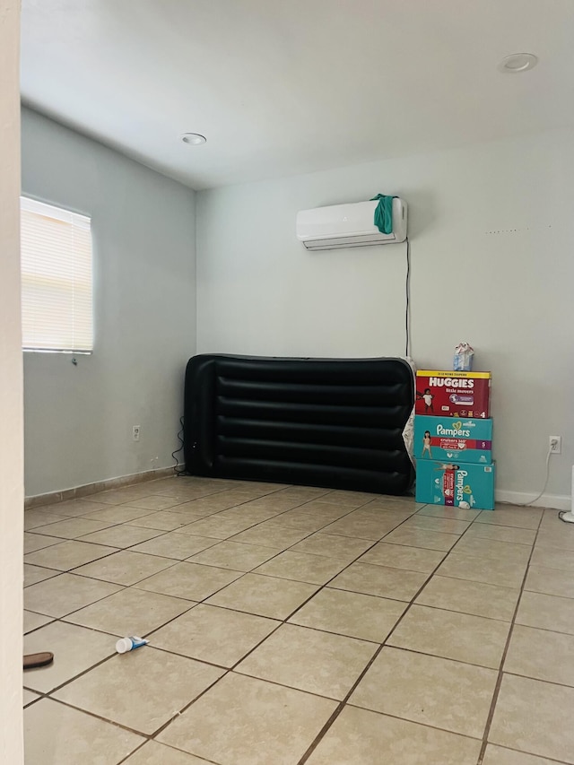 interior details with baseboards, recessed lighting, and a wall mounted AC