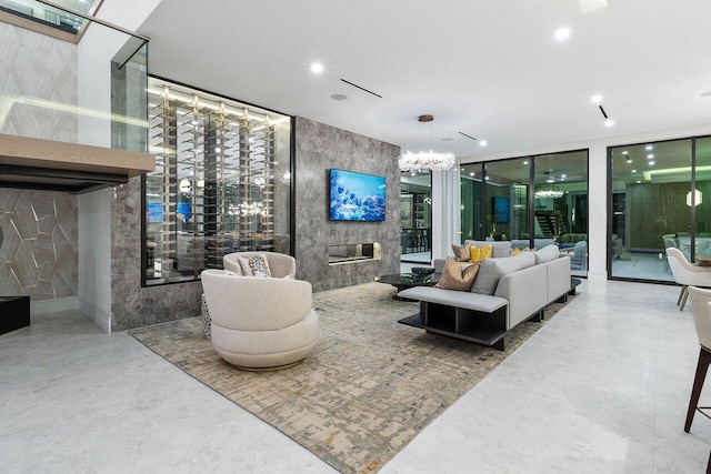 217 Thatch Palm Dr, Boca Raton, FL 33432 - living room featuring floor to ceiling windows, recessed lighting, and a chandelier