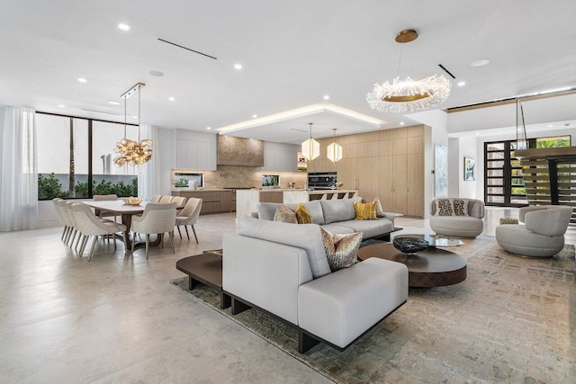 217 Thatch Palm Dr, Boca Raton, FL 33432 - living room with a chandelier and recessed lighting