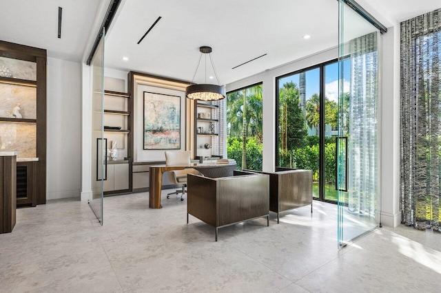 217 Thatch Palm Dr, Boca Raton, FL 33432 - office area with plenty of natural light, finished concrete floors, and built in features