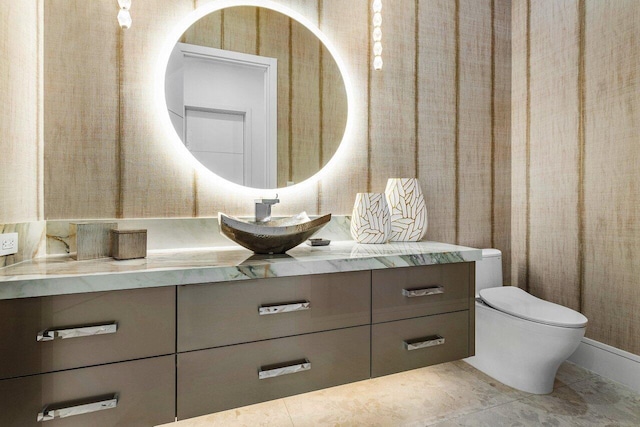 217 Thatch Palm Dr, Boca Raton, FL 33432 - bathroom with toilet, vanity, and tile patterned floors