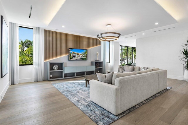 217 Thatch Palm Dr, Boca Raton, FL 33432 - living room with baseboards, wood finished floors, recessed lighting, and a chandelier