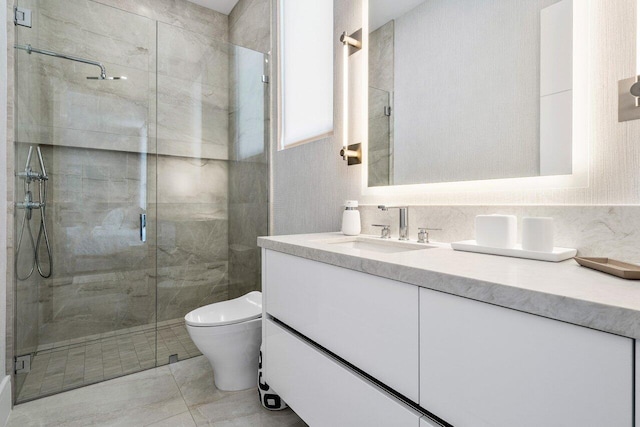 217 Thatch Palm Dr, Boca Raton, FL 33432 - bathroom featuring a stall shower, vanity, and toilet