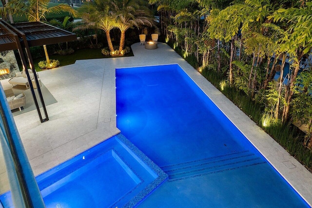 217 Thatch Palm Dr, Boca Raton, FL 33432 - view of swimming pool featuring a pool with connected hot tub and a patio
