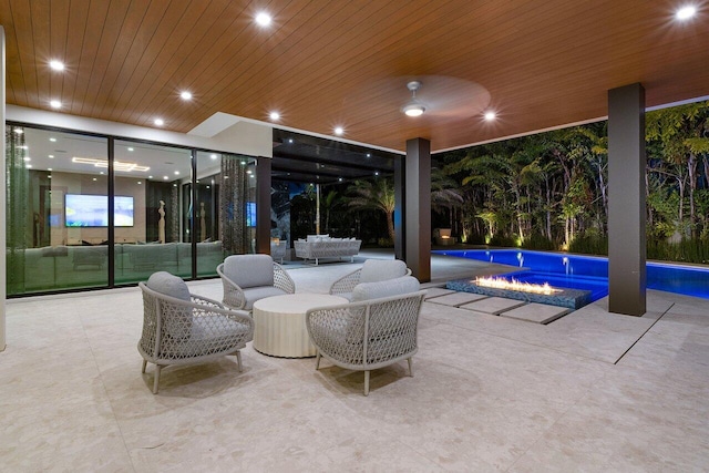 217 Thatch Palm Dr, Boca Raton, FL 33432 - view of patio / terrace with an outdoor pool and an outdoor living space