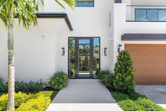 doorway to property with stucco siding